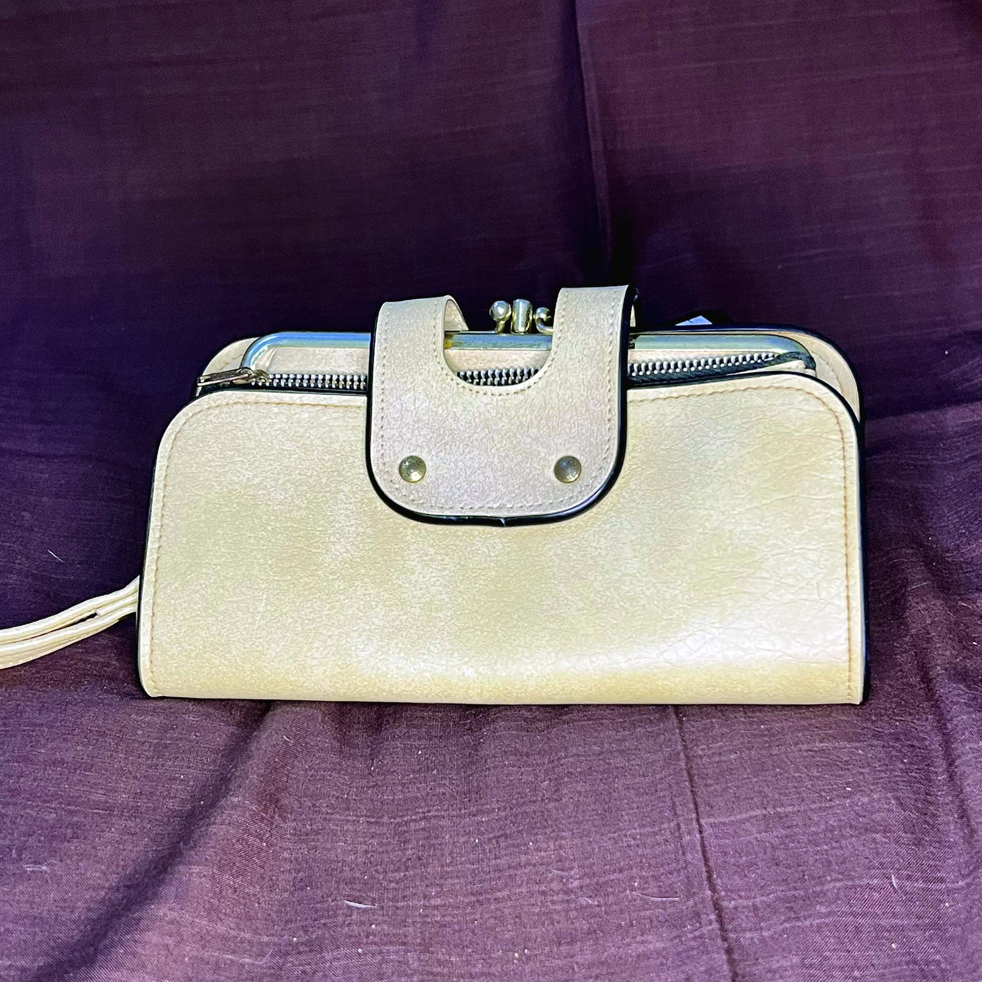 Peach colour leather clutch
