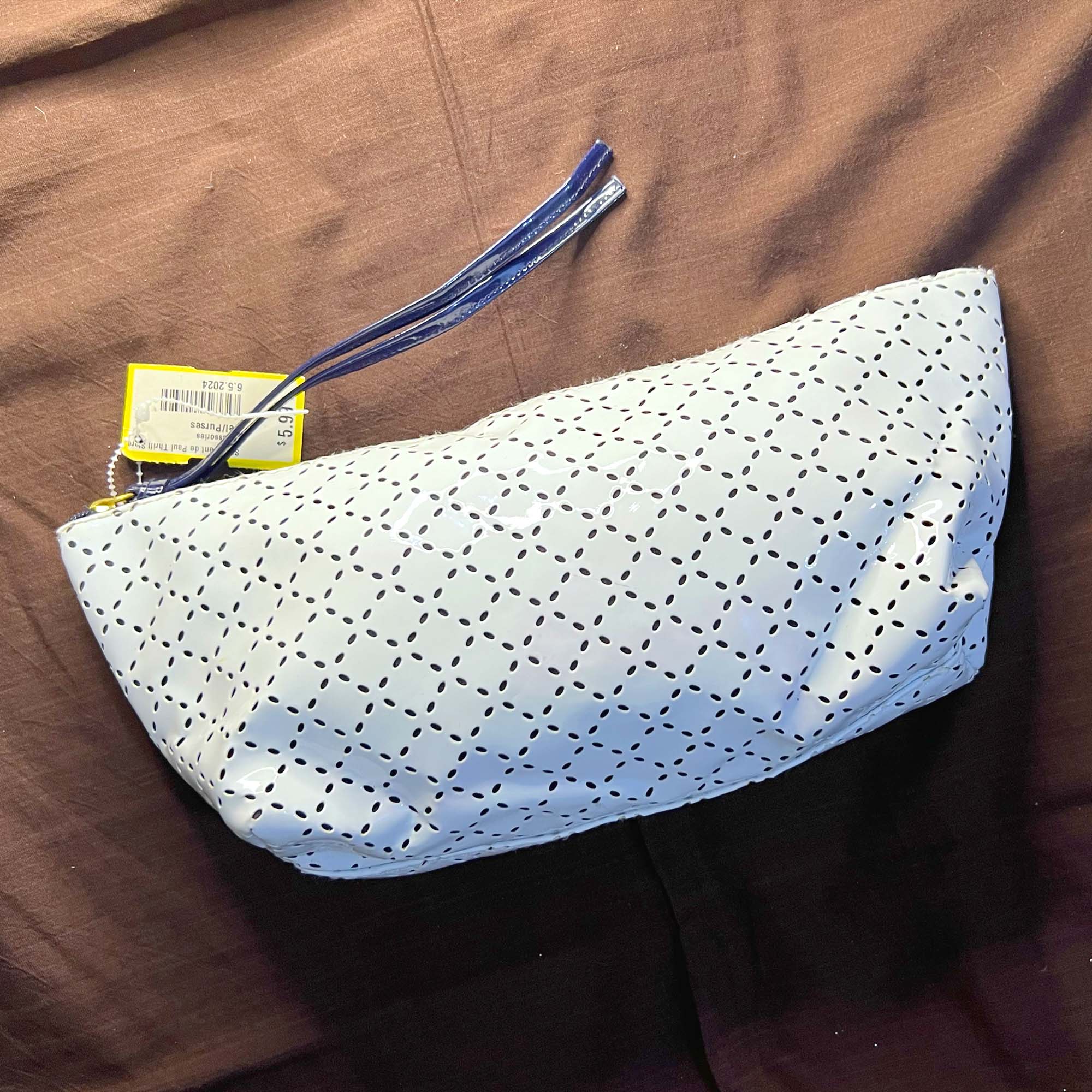 white zipper clutch